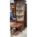 An Edwardian rosewood corner table with inlaid decoration,