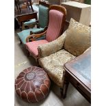 An Edwardian upholstered salon chair together with a Victorian mahogany library chair,