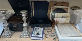 A tabletop gramophone, together with records, electroplated candlesticks, white metal bracelets.