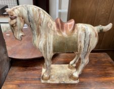 A large pottery Tang style horse