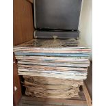 A collection of records, including Mozart, Perry Como,