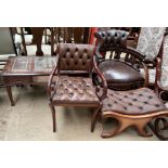 A reproduction mahogany coffee table with a glazed central panel and drawers on square legs,