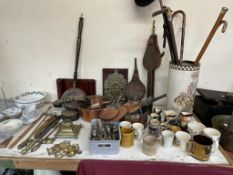 Copper saucepans, together with a bellows, brass inkwell, toasting forks, pottery mugs,