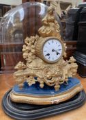 A gilt spelter mantle clock,