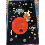 A Guggenheim Modern Arts Collection wool rug inspired by Kandinsky,