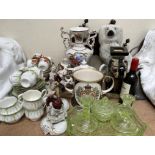 A Staffordshire spaniel together with part tea sets, green glass dressing table set,