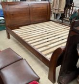 A super king size hardwood sleigh bed