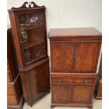 A 20th century mahogany standing corner cupboard together with a mahogany drinks cabinet