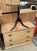 A modern oak chest with three long drawers on a plinth together with a modern tripod table