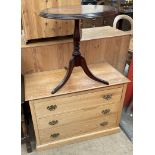 A modern oak chest with three long drawers on a plinth together with a modern tripod table