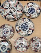 A collection of Japanese Imari chargers and plates