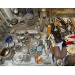 A collection of silver topped and glass dressing table pots, together with electroplated examples,