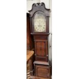 A 19th century oak long case clock, with a broken swan neck pediment and fluted columns,