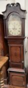 A 19th century oak long case clock, with a broken swan neck pediment and fluted columns,