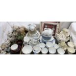 A Shelley rose decorated part tea set together with two other part tea sets,