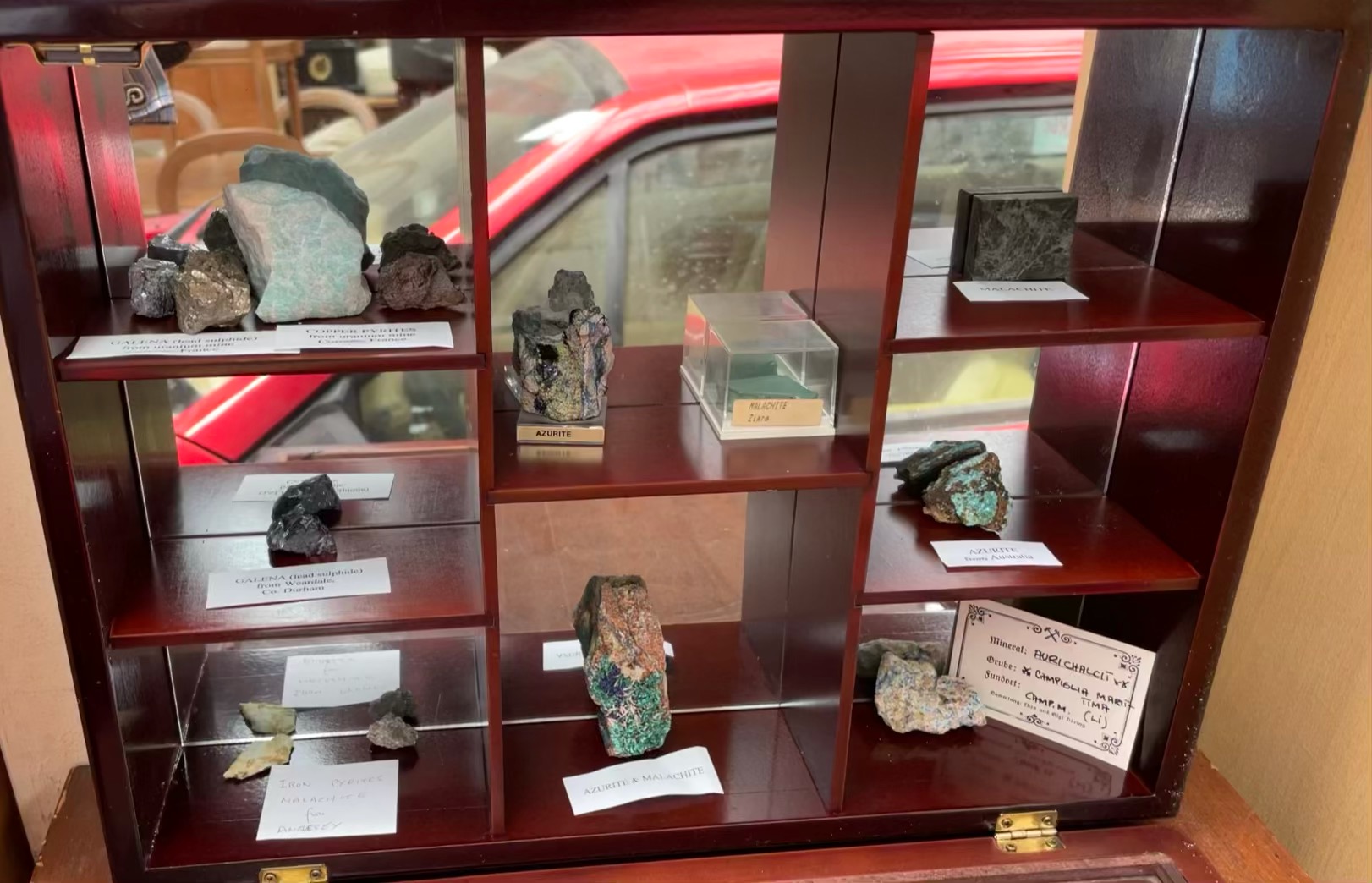 A collection of rock and mineral samples including malacite, Azurite,