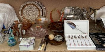 A Mdina glass paperweight together with a glass dressing table set,