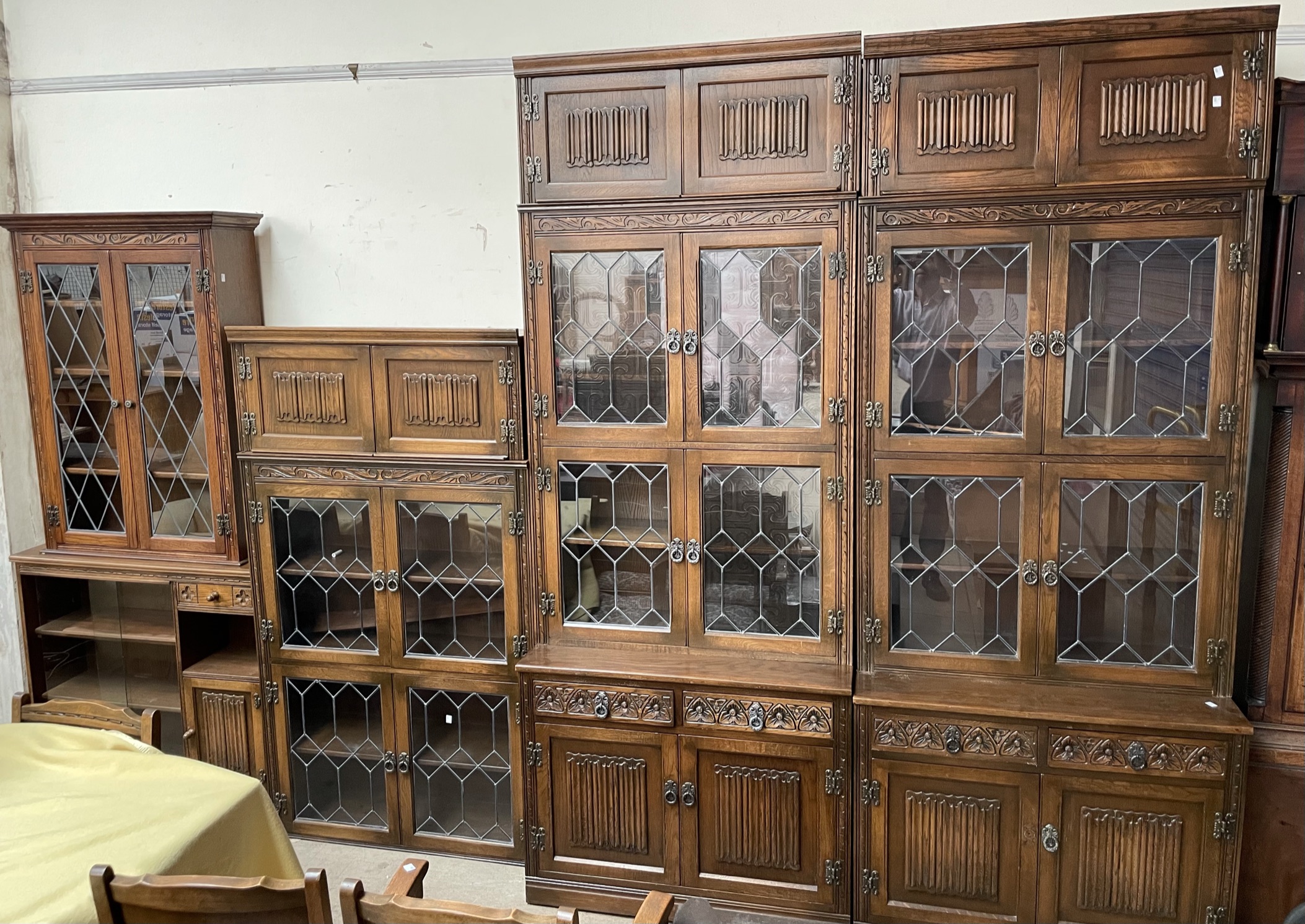 A 20th century oak wall unit with multiple sections,