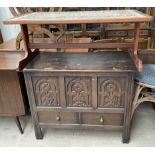 A mid 20th century teak tiled top coffee table together with a 20th century oak coffer