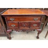 A reproduction mahogany side cabinet,