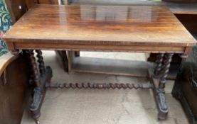 A Victorian rosewood side table with a rectangular top and rounded corners on barley twist legs