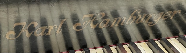 A Karl Hamburger ebonised baby grand piano, metal framed, - Image 2 of 2