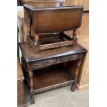 An oak side table with two drawers and an undertier together with a small occasional table with
