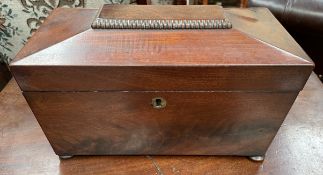 A Victorian mahogany sarcophagus shaped tea caddy