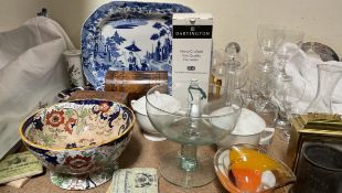 A blue and white pottery meat plate decorated with a queen in a landscape together with a Victorian