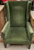 A 19th century upholstered wing back library chair,