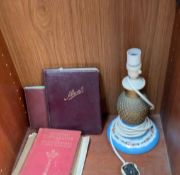 A porcelain table lamp together with schoolboy Autograph albums etc