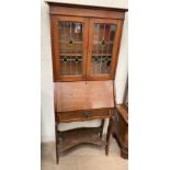 A 20th century oak bureau bookcase,