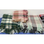 Three woolen blankets