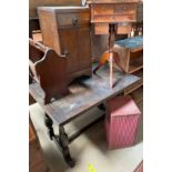 A 20th century oak drawleaf dining table together with an oak pot cupboard, a mahogany work table,