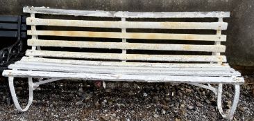 A white painted garden bench