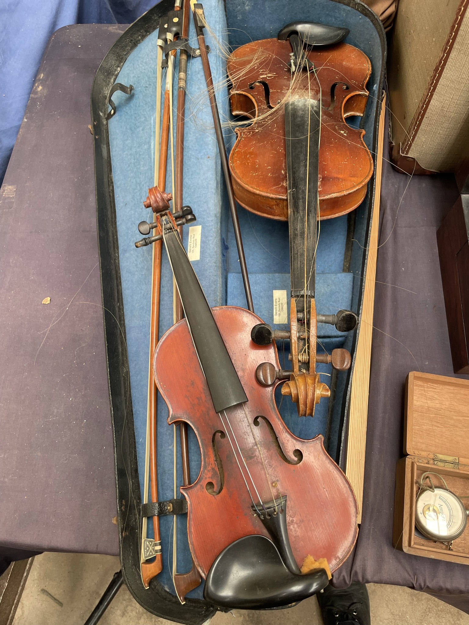 A Violin with a one piece back,