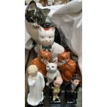 A Studio Six model of a cat designed by Seneshall, together with a pair of Babbacombe pottery cats,