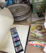 A stamp album, together with Ladybird books, a Tiffany style ceiling lamp shade,