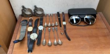 A pair of Julbo Spectron X2 sun glasses together with a collection of wristwatches etc