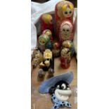 A collection of Russian dolls together with cloisonne enamel owls,