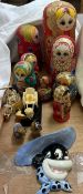 A collection of Russian dolls together with cloisonne enamel owls,