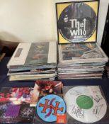 A collection of LP's including David Bowie, Genesis, Simple Minds, The Damned, Elton john,
