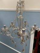 A glass lustre drop chandelier with eight branches together with another glass lustre drop