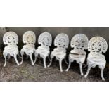 A set of six white painted aluminium garden chairs