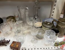 Glass decanters, together with drinking glasses, studio pottery, carved rhinoceros,