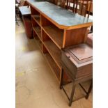 An oak work table together with a bookcase