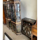 A pair of Chinoiserie decorated corner display cabinets together with a similar side cabinet