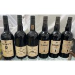 Three bottles of Sandeman Vintage 1957 Port,