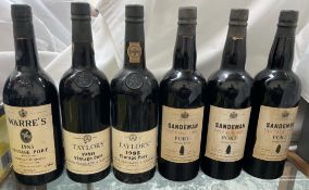 Three bottles of Sandeman Vintage 1957 Port,