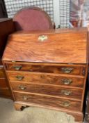 A George III mahogany bureau,